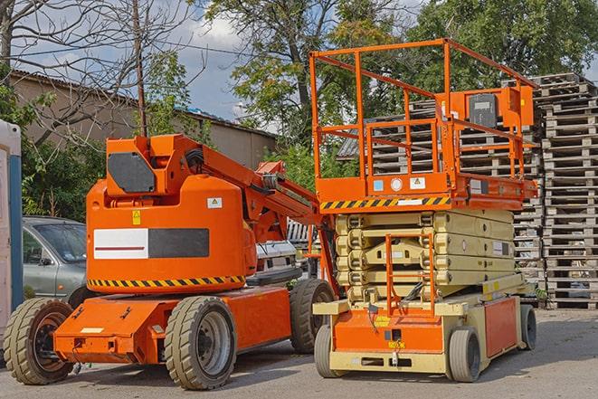 warehouse worker operating a forklift in a shipping yard in Clark